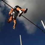 Pole vaulter in the air